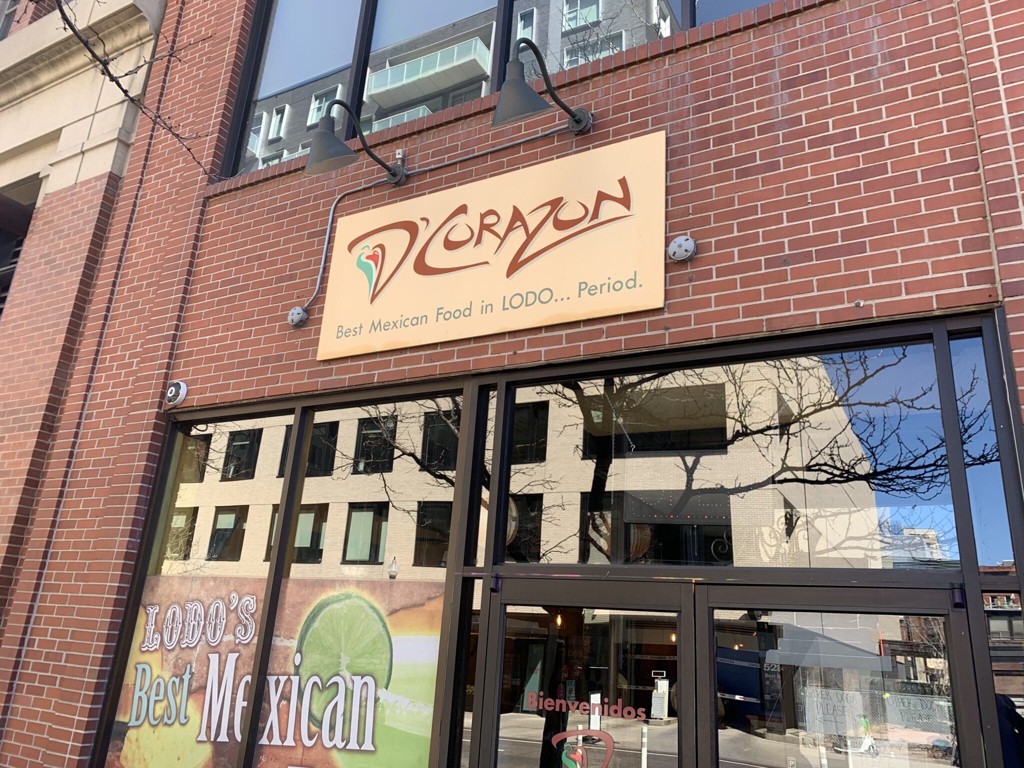 Mexican restaurant facade with sign and windows.