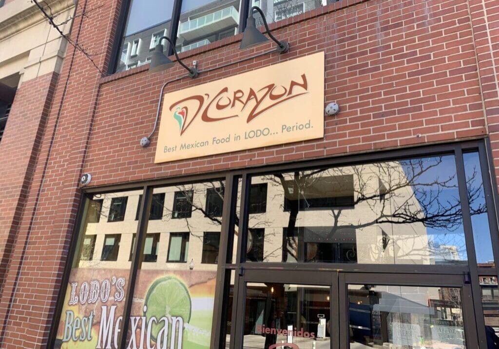Mexican restaurant facade with sign and windows.